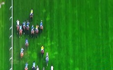 Approaching the crucial moment which helped decide the outcome of the race

Half Yours, one off the inside, faced by a wall of runners heads towards a gap which is so small it is hardly worthy of the name