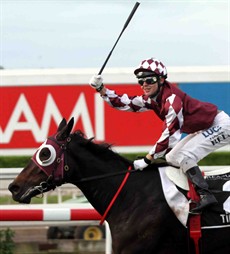 Tim Bell celebrates the wins of Tinto in the Queensland Oaks ...