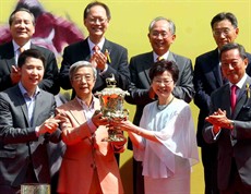 At the HKSAR Chief Executive's Cup presentation ceremony, The Hon Mrs Carrie Lam Cheng Yuet-ngor, Chief Secretary for Administration of the Hong Kong Special Administrative Region, presents the winning trophy, silver dish and silver tankards to the winning owner Mr Wong Kwok Keung, trainer Tony Millard and jockey Joao Moreira of Golden Harvest.