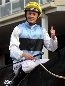 A big thumbs-up after guiding Smokin' Joey to victory in the Eye Liner 