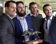 Rock Royalty's owners with their trophy after the gelding had taken out the Ipswich Dash in track record time