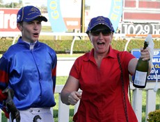 ... celebrating with trainer Sue Grills