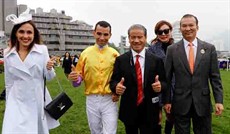 Peniaphobia’s jockey Joao Moreira, trainer Tony Cruz, owner Huang Kai Wen and related connections celebrate their success after taking the LONGINES Hong Kong Sprint.