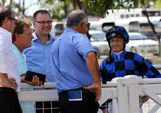 Reporting back to Rob Heathcote and Buffering's owners after the track gallop at Doomben last Wednesday (pictured below)