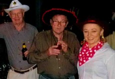 Ron Casey (centre) enjoys a Christmas party at his great mate Hadyn Flynn’s residence among several racing celebrities. Yet another character of the track who has passed