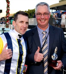 Leith Innes and Tony Pike celebrate Provocative's win in the Group 1 Queensland Oaks