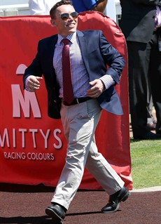 Do you think he is excited?

Chris Munce on the move to the winners' enclosure after Ours To Keep had lined his field in the first two-year-old colts and geldings race of the season at Doomben on Saturday

Photos: Graham Potter