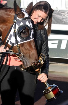 Hayley Nichols with her favourite horse Miss Cover Girl after the mare's victory in the Group 1 Tatts Tiara (below)