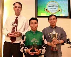 Garden City Trophy winning connections smile for the camera: (from left) trainer Shane Baertschiger, apprentice jockey 
Matthew Poon and Michael Oh from MA Racing Stable