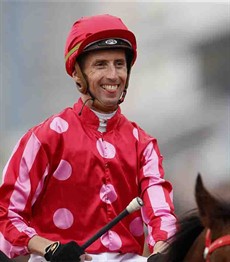 A delighted Nash Rawiller brings Stunning back to scale after securing victory the G2 BOCHK Wealth Management Jockey Club Sprint (1200m turf) at Sha Tin racecourse today.
