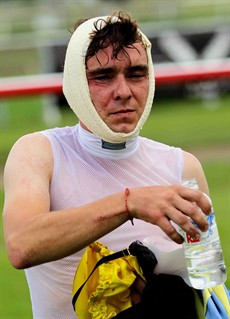Jarrod Woodhouse had a fall in a race preceding the Cannonball Final at the last Kilcoy meeting and was unable to take the mount on Life’s Like That who won that race. Here he is bruised and battered after his fall. A few stitches later he was good as new! He has a good chance of getting back into the winner's enclosure (see race 2)