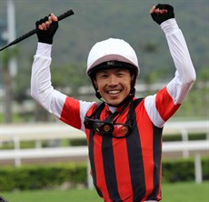The Hatakeyama trained Win Bright and M Matsuokasalutes in the FWD Group 1 QE11 Cup