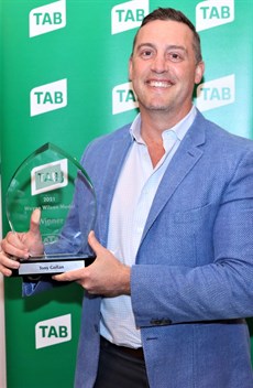 Tony Gollan ... celebrating a special award

Photo: Darren Winningham