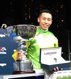 Vincent Ho with the spoils of victory