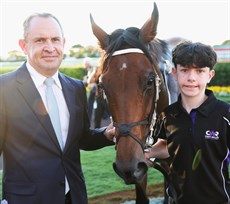 Chris Waller, Imperialist and strapper Harry Cahill after the Rough Habit Plate win
