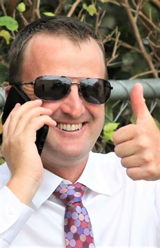 Anthony Collins ... a thumbs up for the tipping challenge. Looks like he doesn't know he is going to get towelled

Photos: Graham Potter and Darren Winningham