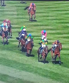Nick Rockett and I'm Am Maximus come away to fight out the finish of an historic 2025 Grand National