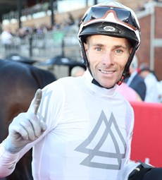A very happy Jamie Mott after taking out the Group 2 Victory Stakes aboard the Archibald trained Libertad