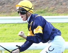 The winning reactions from Tim Clark (above) and Martin Harley (below) as they take War Machine and Cool Archie through the line to salute in the Stradbroke Handicap and the JJ Atkins respectively ... the two Group 1 races decided at Eagle Farm on Saturday