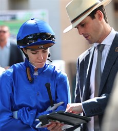 Angela Jones, in the royal blue colours of Godolphin, and James Cummings