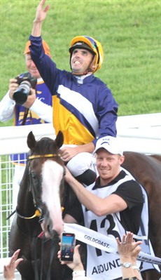 Abounding pictured returning to scale (above) and winning the $3 miillion Magic Millions Guineas in 2024. She will be looking to recapture the good times when she tackles the Group 1 Tatts Tiara on Saturday