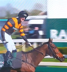 That special moment. Patrick Mullins takes Nick Rockett through the line to complete the first father / son Grand National truimph in twenty-five years

Photos ITV